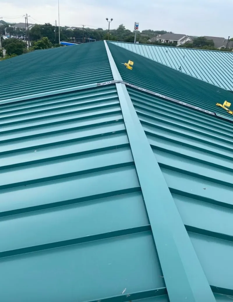 Green commercial metal roof ridge and valley for Metal Roof Repair in Richland
